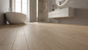 Carrelage imitation parquet salle de bain : prix, formats et pose en 2026