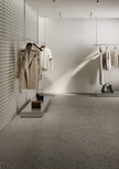 Fioranese Bits Grey en situation — carrelage effet terrazzo