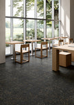Fioranese Bits Black en situation — carrelage effet terrazzo